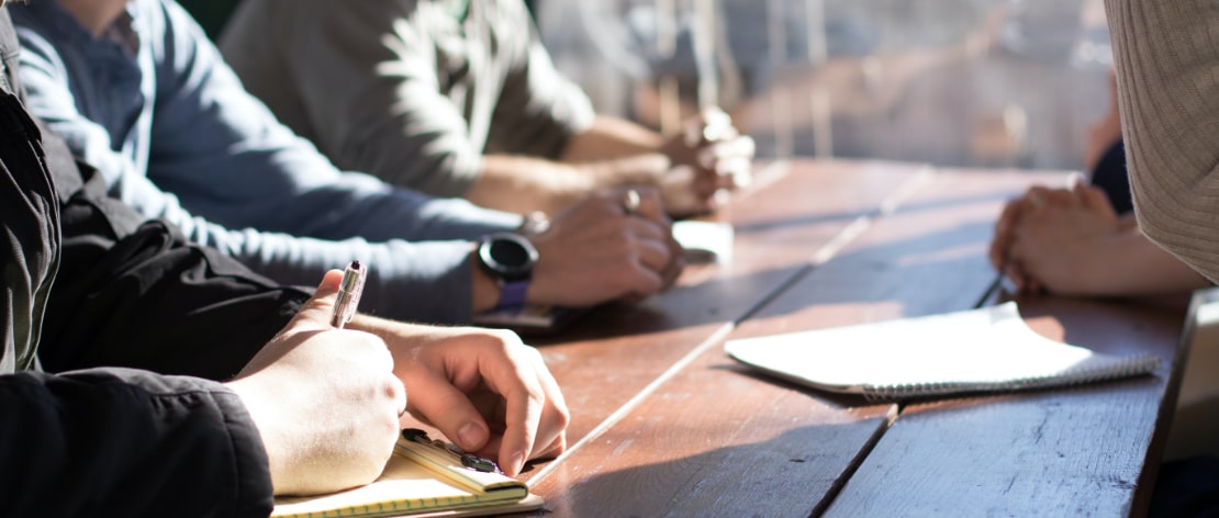 B2B Marketing Agency staff around a table